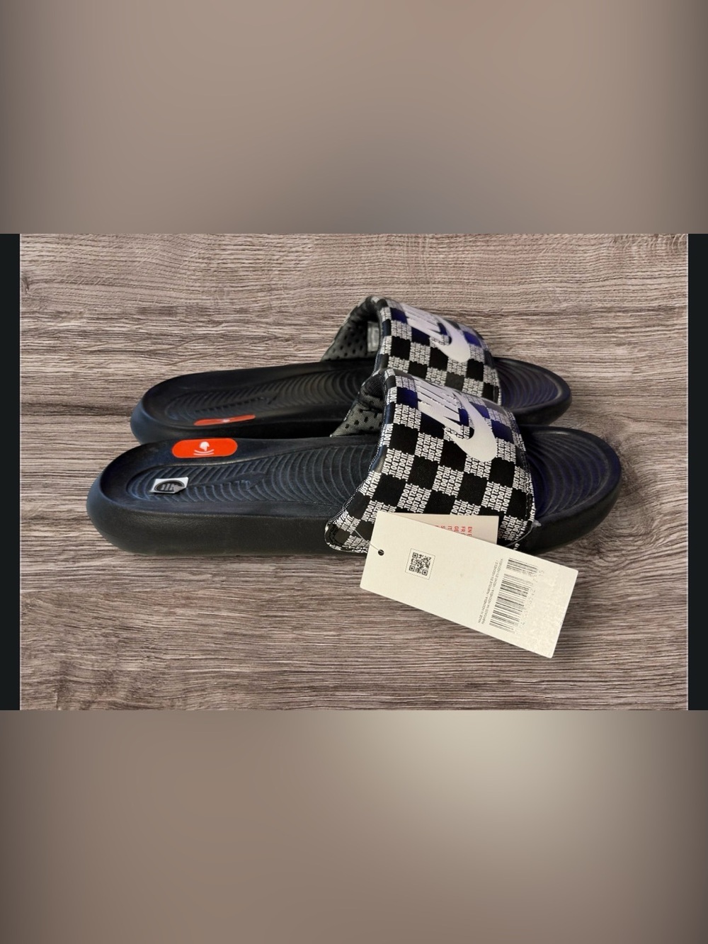 Nike Victori One Printed Slide in a black and white checkerboard "Just Do It"
